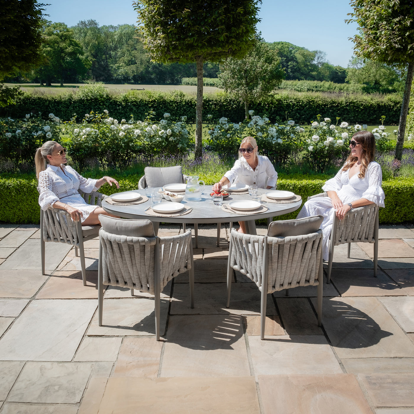 Milan Rope Weave 6 Seat Oval Dining Set in Cool Linen by Maze Rattan. GardenBox Price £1949