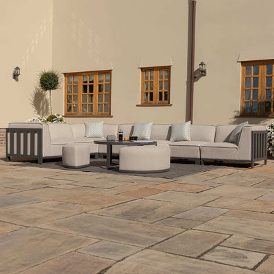 IBIZA Large Corner Sofa Set with round coffee table with 3 foot stools by Maze Rattan. GardenBox Price £4549