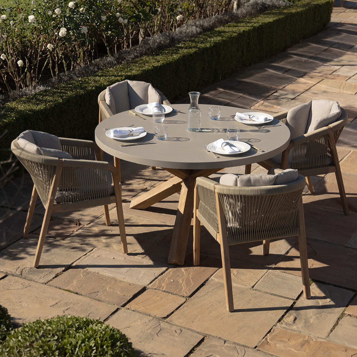 Martinique 4 Seat Round Dining Set with 135cm Concrete Table Top. GardenBox Price £1449