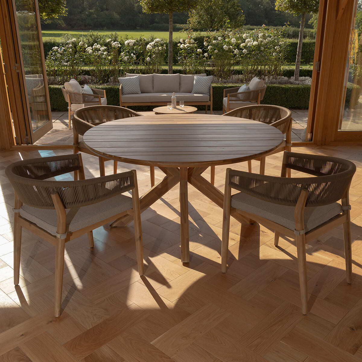 Porto 4 Seat Round Dining Set with 140cm Round Table by Maze Rattan. GardenBox Price £1049