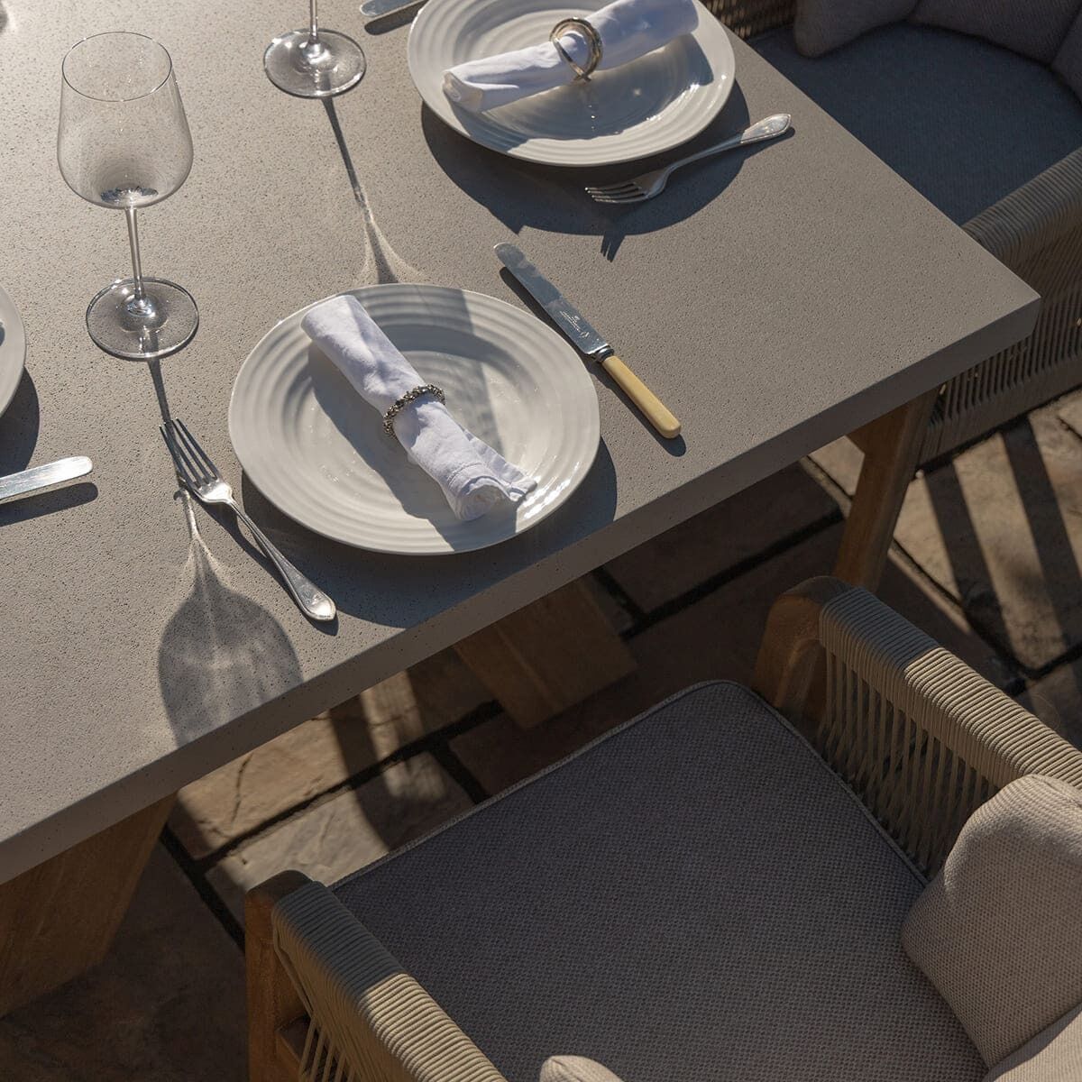 Martinique 8 Seat Rectangular Dining Set with 230cm Concrete Table Top. GardenBox Price £2449